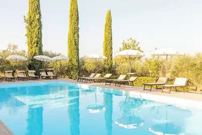 Image de Il Greppo - Appartamento Greppino' avec piscine partagée, Wi-Fi et climatisation