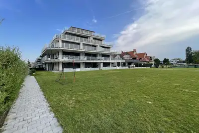 Image de Appartement de vacances avec plage privée, WiFi et climatisation