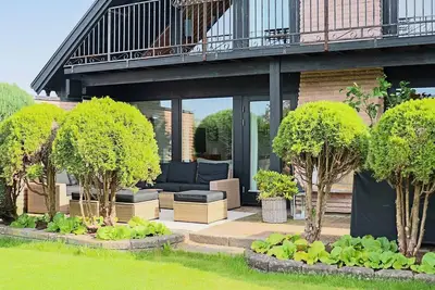 Image de Maison de vacances pour 8 a Förslöv-By Traum