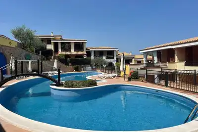 Image de Appartement de vacances 'Residenza Del Sole' avec piscine partagée, terrasse et climatisation