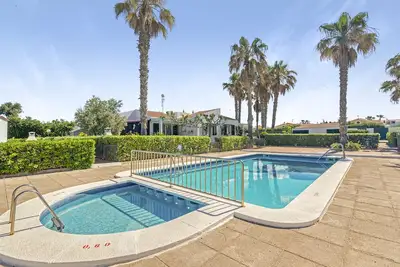 Maison de vacances 'Sa Calma House' avec piscine partagée, terrasse privée et climatisation