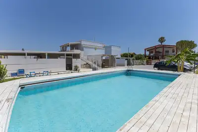 Image de Appartement 'Corallo In Oasi Del Mare' avec vue sur la mer et Wi-Fi