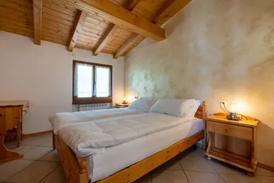 Image de Ferme 'Agriturismo Val D' Egoi App 3' avec vue sur les montagnes, jardin partagé et Wi-Fi