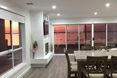 Image de Stunning waterfront home situated amid the Black Bull Golf Course & Sebel Resort