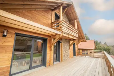 Image de Chalet neuf 14p avec jacuzzi, sauna et grande salle de jeux