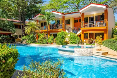 Ground-floor apartment with pool, private patio, grill, & Ac