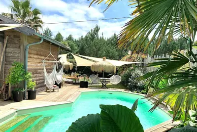 Image de Maison ambiance cabane exotique climatisée piscine & spa