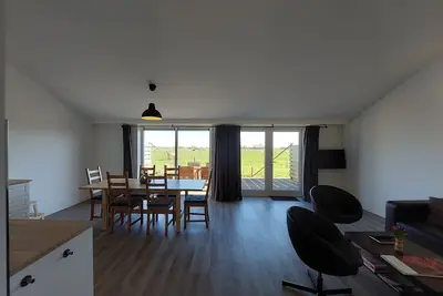 De Plevier<br>Apartment with a beautiful view over the horse pasture near the sea