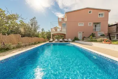 Image de Appartement de quatre chambres avec la terrasse Stara Vas, Pag (A-21031-a)