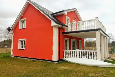 Image de Maison de vacances א Nowe Warpno avec jardin