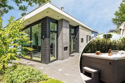 Image de ✓ Natuurlodge at Recreatiepark het Esmeer ✓ Holiday home for 4 persons ✓ Located in Aalst (Gelderland) ✓ Waterside holiday park ✓ Book directly through the park