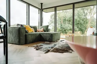 Image de New, top modern and stylish vacation apartment on the kl. Lake near Mirow in a dream location