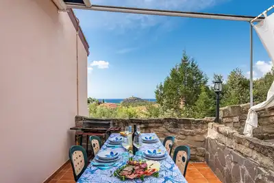 Image de Maison de vacances \"Villa Leonardo Sud Sardegna\" avec vue sur la mer, terrasse privée et Wi-Fi