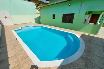 House with large swimming pool near the sea