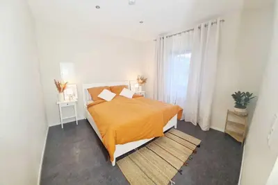 Image de Ferienwohnung mit Sonnenterrasse und Blick auf die Sauer