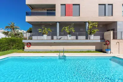 Image de Appartement 'Prestige Home' avec piscine partagée, terrasse privée et climatisation