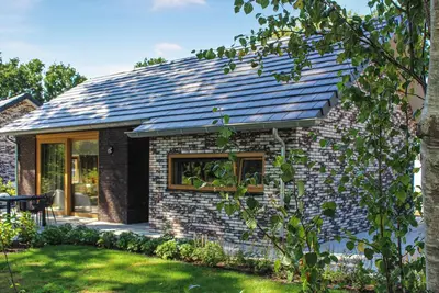 Image de Maison confortable Ă IJhorst avec.