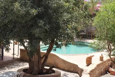 Image de A 5 minutes de la ville, 7 chambres, 16 couchages, piscine, petit déjeuner inclus.