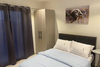 Image de Studio Apartment at The Lennox- 3 min from the airport!