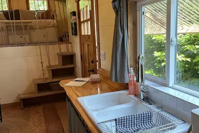 Image de Tiny home on working gourmet mushroom farm just minutes outside of Gibsons.