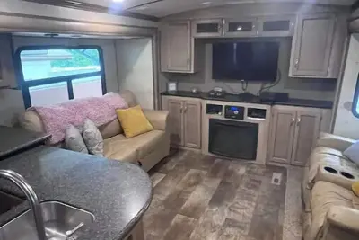 Image de Cozy Camper with Outdoor Hangout space