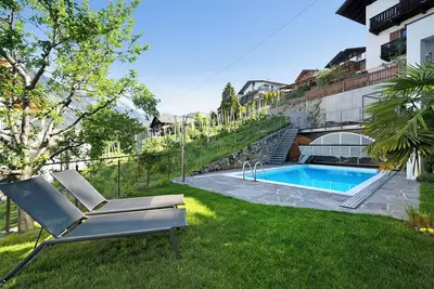 Image de Appartement de vacances \"Nelkenstein Herbst\" avec vue sur les montagnes, piscine partagée et Wi-Fi