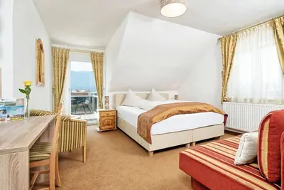 Image de Komfortzimmer mit Seeblick - Hotel-pension Melcher