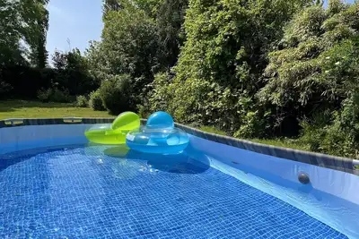 Image de 4 km from the sea, swimming pool, spa, bicycles, garden, river