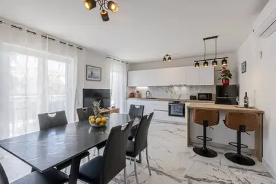 Image de Seaside Sanctuary: Modern 3 Bedroom and 3 Bathroom apartment 2 mins from Beach