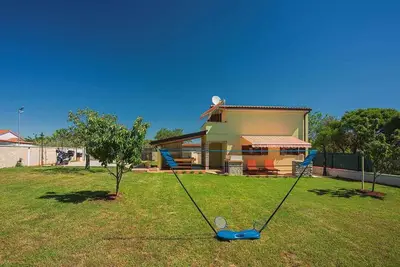 Image de Maison de vacances avec jardin et air conditionné