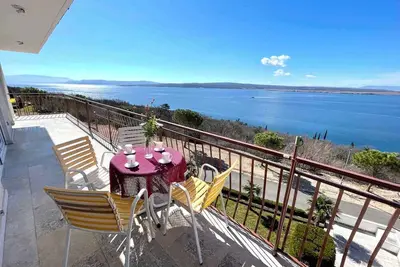 Image de Appartement de vacances avec balcon avec vue et climatisation