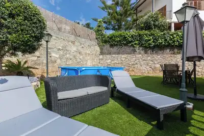 Image de Appartement \"Bruc Beach\" avec piscine privée, Wi-Fi et climatisation