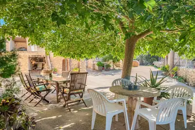 Image de Maison de campagne \"Ca S'Hereu\" avec vue sur les montagnes, terrasse privée et Wi-Fi
