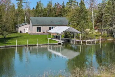 Waterfront Cottage with Covered Boat Slip