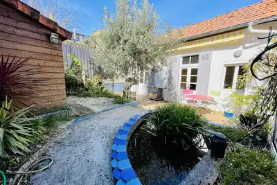 Image de Maison Arcachon: proche centre, plage et parc. Terrasse ensoleillée, 2 mezzanines, animaux acceptés.