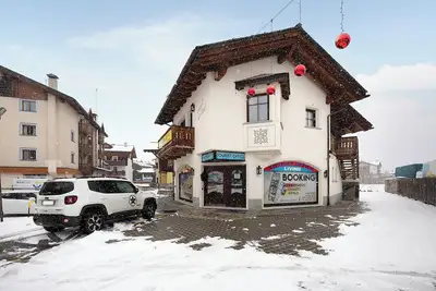 Image de Appartement 'Chalet Li Palù Trilocale 2' avec vue sur la montagne, balcon et Wi-Fi