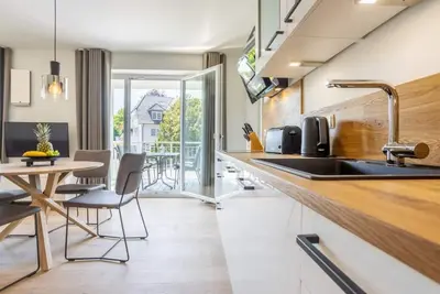 Image de Villa Dornkamp 3 - Luxurious vacation apartment for 4 people including sauna and balcony