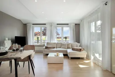 Image de Appartement \"Römerpark Bergblick\" avec vue sur la montagne, balcon, garage et Wifi