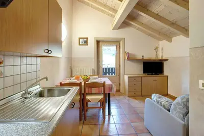 Image de Appartement 'Appartamenti Lorenza 3 Baite Giotto' avec vue sur la montagne, jardin partagé et Wi-Fi