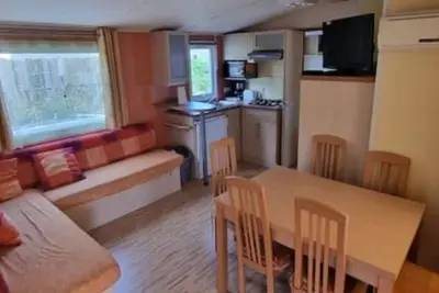 Image de Mobil Home climatisé entre les pins et l'océan! 15 min des plages