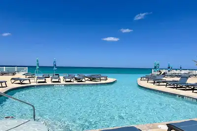Image de Casa Azul welcomes you to a stunning ocean view condo steps away from the beach