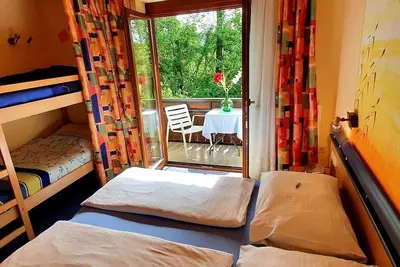 Image de Ferienwohnung A, mit Seeblick - Pension Mühlenheim