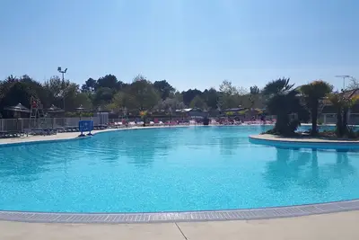 Image de Mobil home, 4*, 3 piscines, plage, 40 m2, terrasse 24 m2 couverte, climatisé