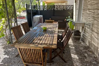 Image de luxury accommodation with swimming pool in lush greenery.