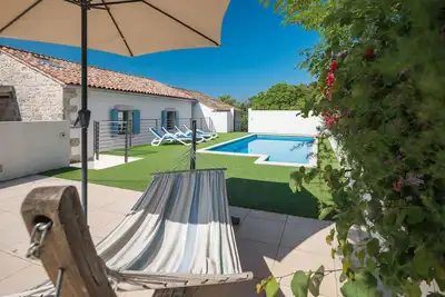 Image de Maison confortable à Lozari avec WiFi