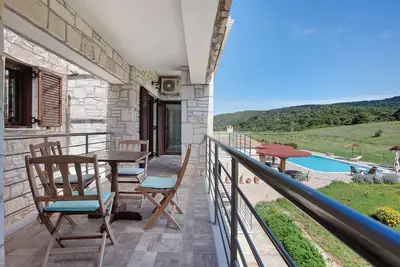 Image de Appartement 'Wild Fig Retreat Sirocco' avec piscine partagée, Wi-Fi et climatisation