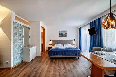 Image de Appartement de vacances \"Residence Alpina - Mono Nr. 5\" avec vue montagne, jardin partagé et Wi-Fi