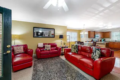 Inviting riverfront condo with fireplace, balcony, central Ac, & W/D