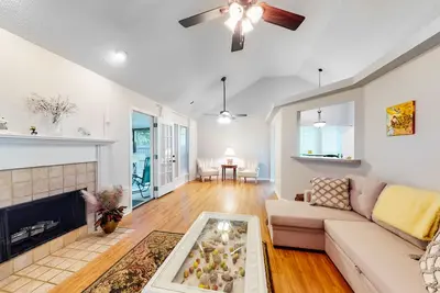 Quiet home with dog-friendly yard, fireplace & screened patio - 30-night min.