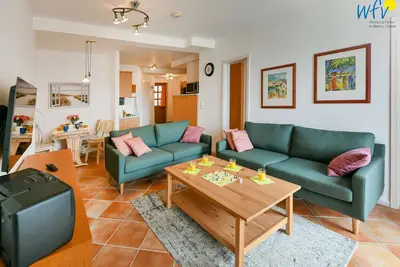Image de Comfortable vacation apartment with lake view and conservatory in the Seedorf vacation park
